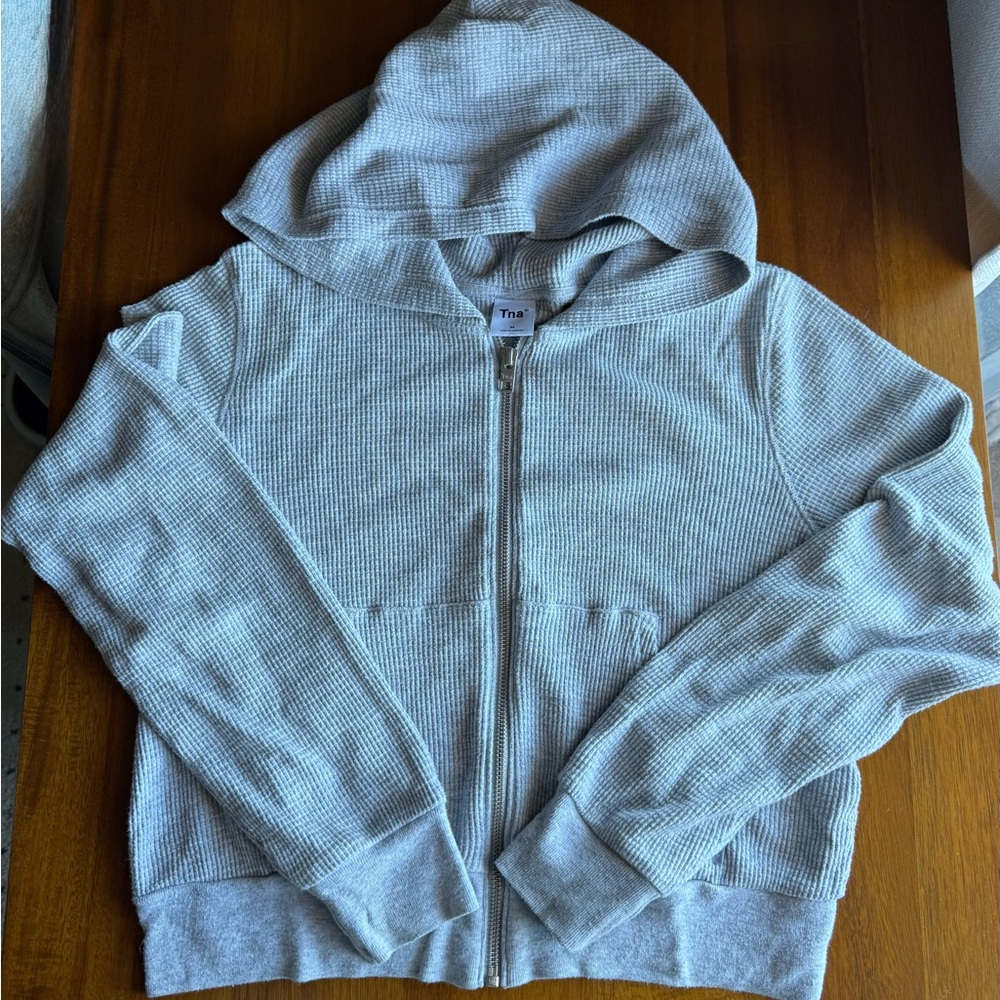 Aritzia’s TNA Light Gray Waffle Knit Zip-Up Hoodie